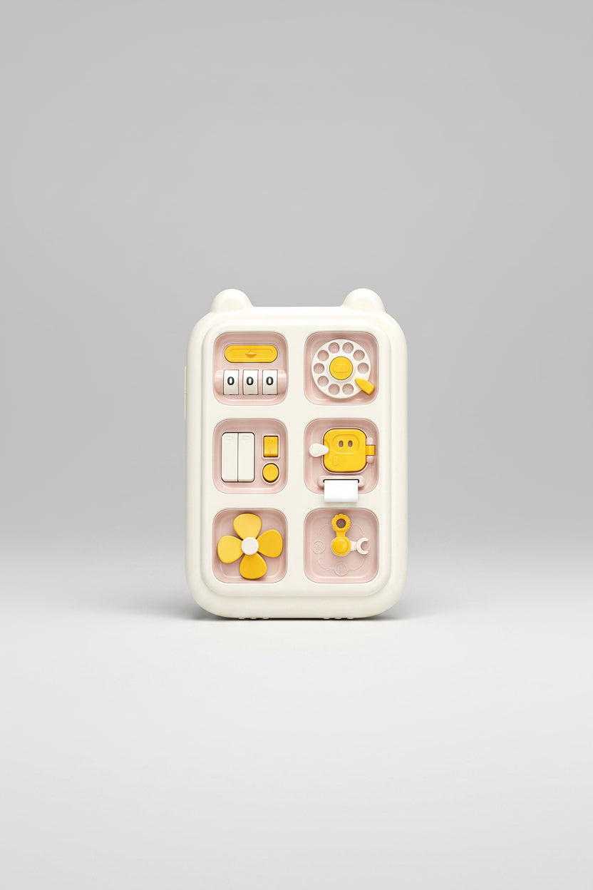 Children's toy set with various shapes and letters in a pink case on a wooden surface.