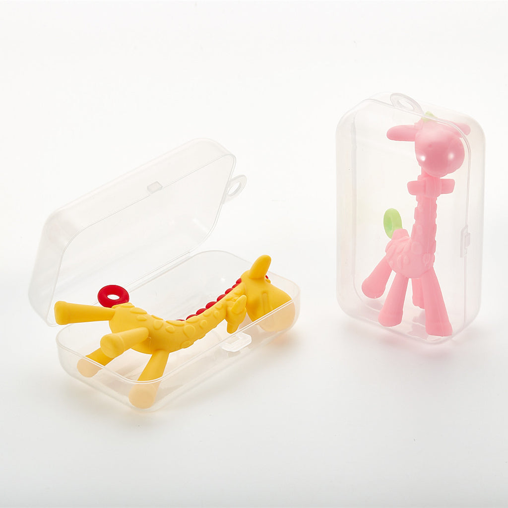 Two giraffe-shaped toys in clear cases on a white background