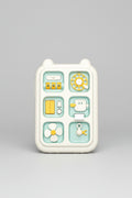 Children's educational toy with various shapes and colors on a wooden surface.