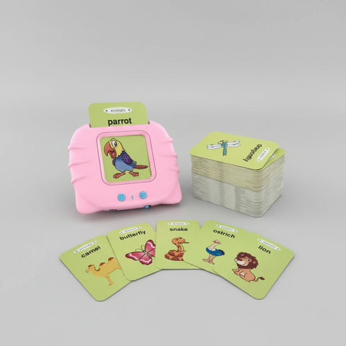 Educational card game with animal illustrations and a pink pillow-like device.