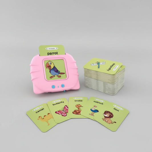 Educational card game with animal illustrations and a pink pillow-like device.